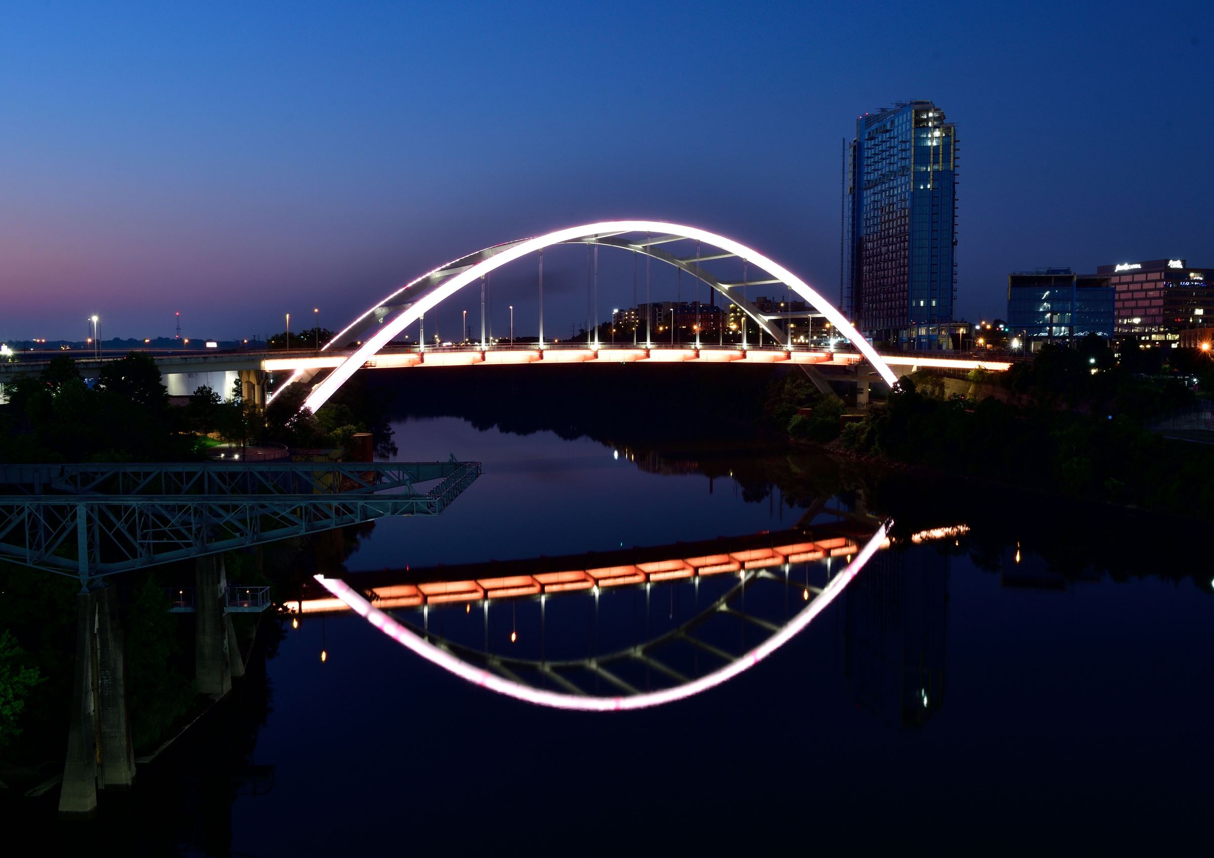 Nashville’s Gateway Bridge lit up at dusk